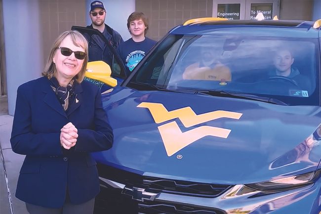Trina Wafle with WVU engineering students who participated in the national Eco Challenge Car