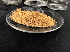 WVU's Rare Earth Extraction Facility produces highly-concentrated rare earth products from coal mine drainage. This sample is 87 percent rare earth oxide. (WVU Photo/Chris Vass)