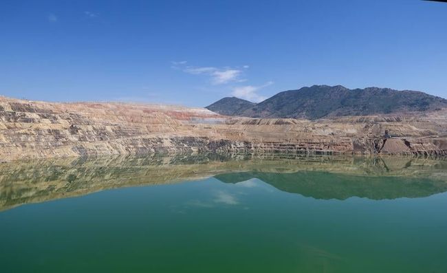 The Berkeley Pit is seen in August 2022. After long being a source of copper and strife, the contaminated Berkeley Pit has also shown to be chock-full of something potentially a little more positive: rare earth elements. (Photo by Trent Sprague)
