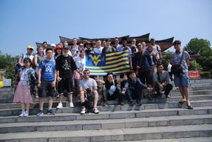 WVU flag in China with students